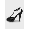 Open toe patent leather shoes