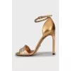 Gold leather stiletto heeled sandals