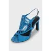 Suede sandals with perforated heels