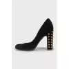 Suede shoes decorated with spikes