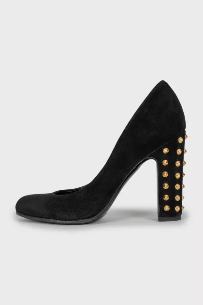 Suede shoes decorated with spikes