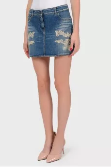 Denim mini-skirt with lace application