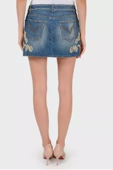 Denim mini-skirt with lace application