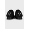 Muscle shoes with metal decor