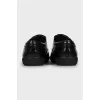Men's black shoes with perforation