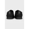 Men's shoes with embossed strap