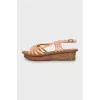 Leather sandals with braiding