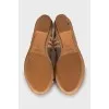 Leather sandals with braiding