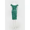 Cocktail green dress in fold