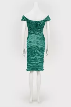 Cocktail green dress in fold