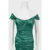 Cocktail green dress in fold