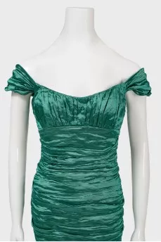Cocktail green dress in fold
