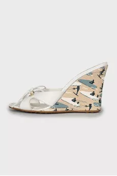 White mules with printed soles
