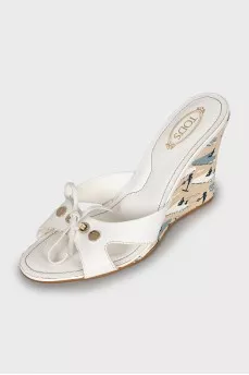 White mules with printed soles
