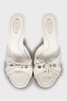 White mules with printed soles