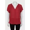 Red silk blouse