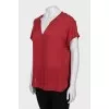 Red silk blouse