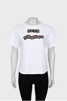 T-shirt with patches and rhinestones