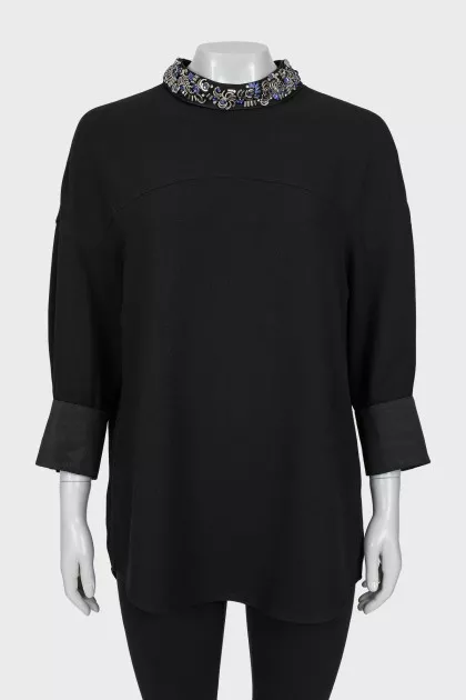 Dress with decorated collar