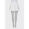 Linen shorts with shaped trim