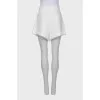 Linen shorts with shaped trim