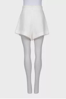 Linen shorts with shaped trim