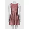 Sleeveless dress in a combination print