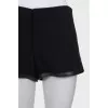 Shorts with leather trim