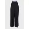 Wide black trousers