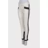 White jeans with black stripes