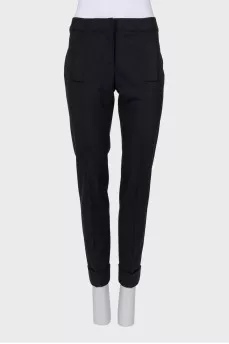 Black tapered trousers with pockets