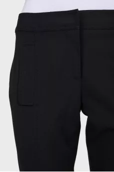 Black tapered trousers with pockets