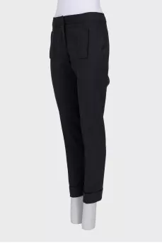 Black tapered trousers with pockets