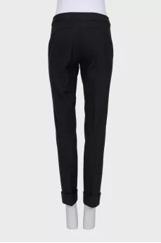 Black tapered trousers with pockets
