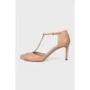 Beige shoes with metallic decor