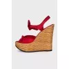 Red sandals with woven soles