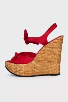 Red sandals with woven soles