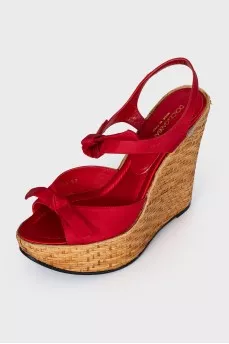 Red sandals with woven soles