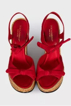 Red sandals with woven soles