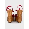 Red sandals with woven soles