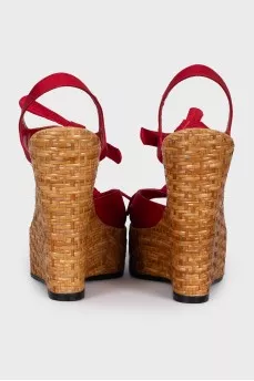 Red sandals with woven soles