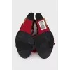 Red sandals with woven soles
