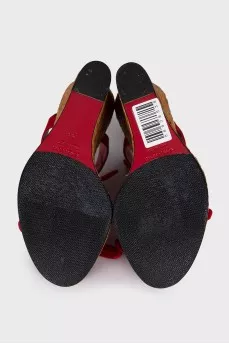 Red sandals with woven soles