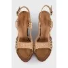 Leather sandals with braided elements