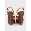 Leather sandals with braided elements