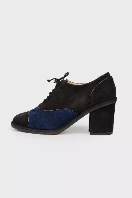 Black shoes with a blue suede insert