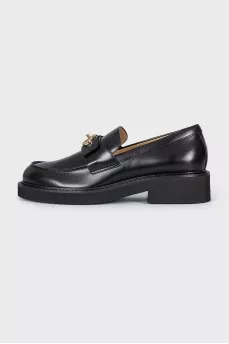 Leather loafers with gold buckle