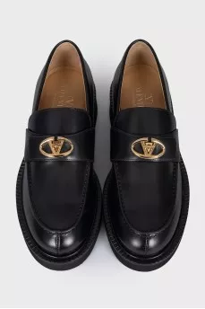 Leather loafers with gold buckle