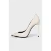 White leather pumps