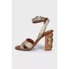 Leather sandals with metal flower